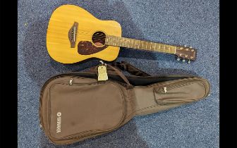 Yamaha FG Junior Acoustic Guitar, six strings, in carrying case.