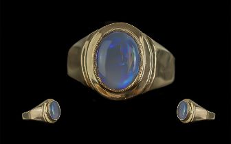 A Fine 14ct Gold Single Stone Opal Set Ring of Oval Form. Marked 14ct to Shank. The Opal of Blue,