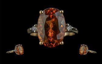 Ladies Excellent 10ct Gold Orange Topaz and Diamond Set Ring. Marked 10ct to Shank. The Oval
