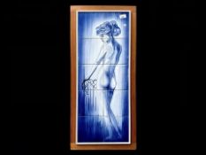 Tiled Framed Image of a Nude, made up of ten blue and white tiles set in an oak frame, with the