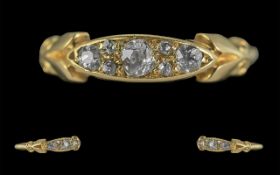 Edwardian Period 1901 - 10 Ladies 18ct Gold Petite Three Stone Diamond Set Ring, the three old cut