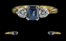 Ladies 18ct Gold and Platinum Attractive 3 Stone Blue Sapphire and Diamond Set Ring. Marked 18ct and