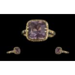 Ladies 9ct Gold Pleasing Single Stone Amethyst Set Ring. With Pleasing Ornate Setting, The Square