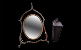 Early 19th Century Mahogany Toilet Mirror, openwork shape with oval central mirror and urn finial.