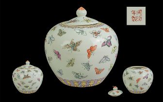 Chinese Hand Painted Porcelain Butterfly Lidded Jar with Tongzi Mark. c.1900. Decorated to Body