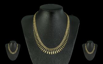Ladies Attractive 9ct Gold Cleopatra Design Necklace. Marked 9.375. Weight 17.4 grams. Length 16