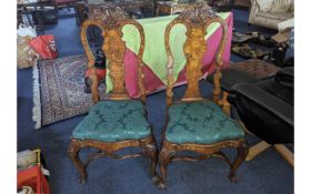 Two 19th Century Dutch Dining Chairs, profusely inlaid throughout, shaped upholstered drop-in seats,