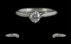 Platinum Single Stone Diamond Dress Ring, marked 950 to shank, the setting, of interesting design,
