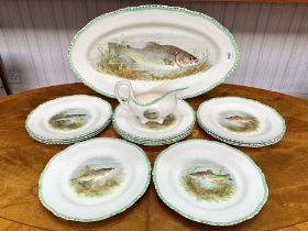 Woods Ivory Ware Oval Fish Platter & 12 Plates, together with a matching sauce boat.