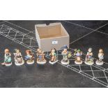 Collection of Goebel Hummel Figures, (8) in total, including girl with watering can No. 74, goat