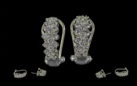Ladies Pair of 14ct White Gold Diamond Set Pair of Earrings. Marked 14ct. The Well Matched