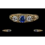 Ladies - Attractive 9ct Gold 3 Stone Sapphire and Diamond Ring. Full Hallmark to Shank. The