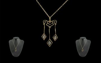 Art Nouveau Attractive and Pleasing Designed 9ct Gold Diamond Set Drop Pendant and Chain. c.1905 -