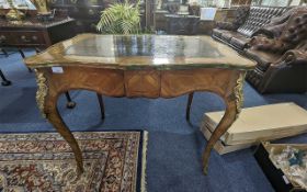 Edwards & Roberts 19th Century Leather Tooled Top Writing Desk, of shaped form, with ormolu