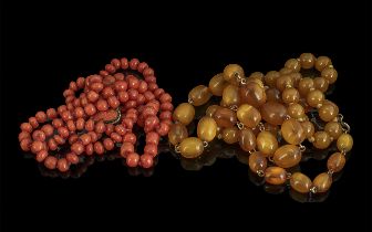 Collection of Amber Coloured Beads, two necklaces together with a 19th/20th Century double strand