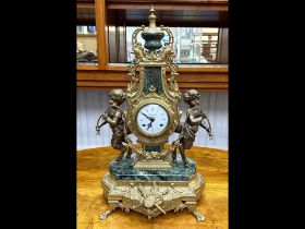 Louis XV Style Brass Clock, white dial with Roman numerals, marked Imperial, made in Italy. Lyre