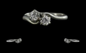18ct Gold - Attractive Two Stone Diamond Set Ring. Marked 18ct to Shank. The Two Round Faceted