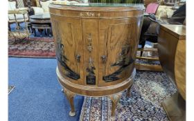 Chinoiserie Decorated Glass Top Bow Fronted Cocktail Cabinet, raised on short cabriole legs.