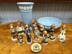 Collection of Goebel Hummel Figures, eleven in total, all assorted shapes and sizes, and a Hummel