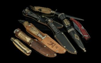 Collection of Eight Hunting & Related Knives, assorted styles, bone handles and deer's foot