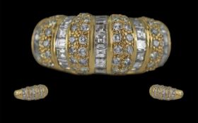 18ct Yellow Gold Attractive Diamond Set Dress Ring. Marked 750 - 18ct to Shank. The Princes Cut