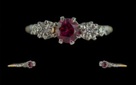 18ct Gold and Platinum Ruby and Diamond Set Ring. Marked 18ct and Platinum to Interior of Shank. The