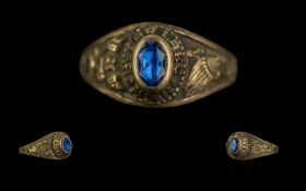 10ct Gold College Ring - With Image of Indian Chief to Shoulders with Other Symbol in Lettering