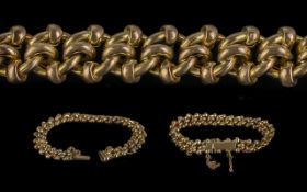 Ladies Attractive 9ct Gold - Well Designed Bracelet, With Good Clasp and Safety Chain. Marked 9ct.