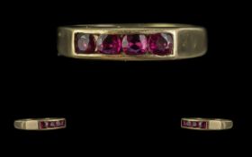 Ladies Attractive 9ct Gold Four Stone Ruby Set Ring, full hallmark to interior of shank. The well-