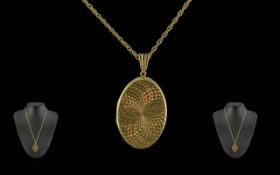 Attractive 9ct Gold Engine Turned Locket with 9ct Gold Chain. Both Chain and Locket Marked 9.375.