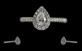 Ladies Contemporary Design 18ct White Gold Pear Shaped Diamond Halo With Diamond Set Shoulders Set