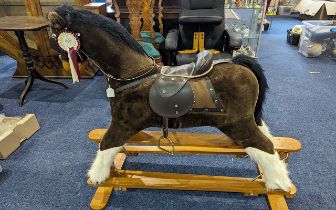 Lovely Hamley's Plush Rocking Horse, brown soft plush finish body with white fetlocks and mane.