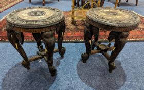 Two Carved Indian Elephant Tables, inlaid with elephant and camel figures to top, raised on four