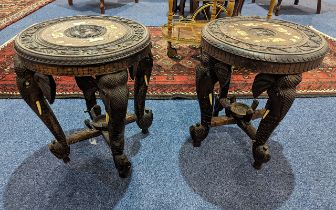 Two Carved Indian Elephant Tables, inlaid with elephant and camel figures to top, raised on four