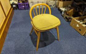 Ercol Low Back Dressing Chair, spindle back, turned legs. Detachable cushioned seat. Height 25'' x