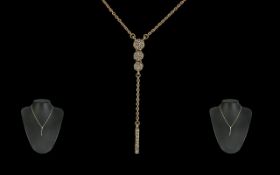 18ct Gold Elegant and Pleasing Diamond Drop Necklace - Marked 18ct (750) The 3 Small Diamond