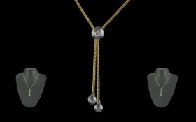 18ct Gold Attractive and Elegant Diamond Set Necklace with Diamond Set Tassel Drops. Marked 750 -