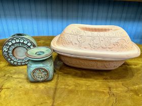 Two Tremar Cornish Studio Pottery Vases, comprising a 4'' vase with a flower design and a 5'' vase