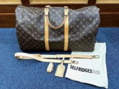 Louis Vuitton Holdall, with iconic Louis Vuitton monogrammed canvas, tan leather trim and dual top