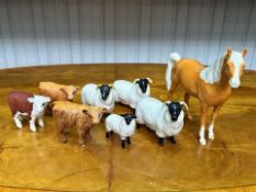 Collection of Beswick Animals, comprising a Palomino horse, four sheep, and three calves.