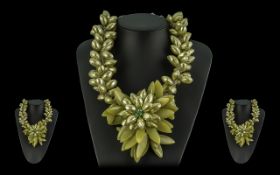 Butler & Wilson Statement Necklace, in the form of a large central flower with a crystal centre
