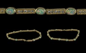14ct Gold - Attractive Opal and Diamond Set Line Bracelet, Marked 14ct. The Ten Well Matched Opals