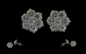Ladies Pair of 18ct White Gold Diamond Set Cluster Earrings. Marked 18ct. Diamonds of Good Colour