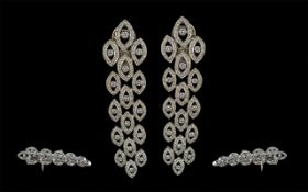 A Stunning Pair of 18ct White Gold Diamond Set Drop Earrings. Excellent design, well matched