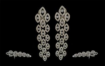 A Stunning Pair of 18ct White Gold Diamond Set Drop Earrings. Excellent design, well matched