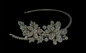 Butler & Wilson Bridal Tiara, beautifully set with crystals, floral design on band. In original