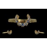 Ladies - Petite and Attractive 18ct Gold Horseshoe Shaped Diamond and Sapphire Set Ring. Marked 18ct