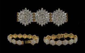 Ladies Contemporary 18ct Gold Pleasing Diamond Set ( Cluster Design ) Bracelet, Marked 18ct.