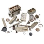 A selection of major parts for a Westbury 15cc seal engine