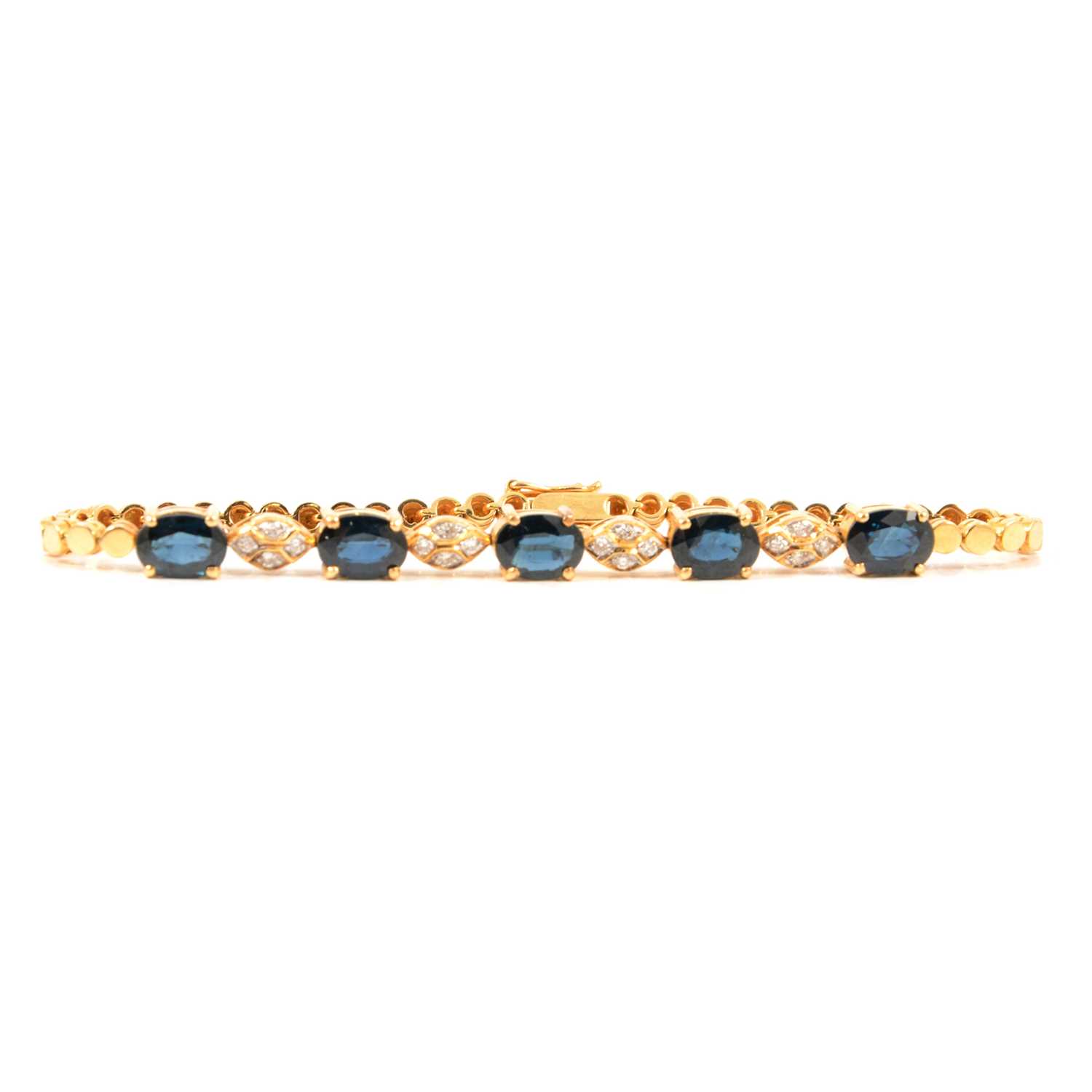 A sapphire and diamond bracelet.